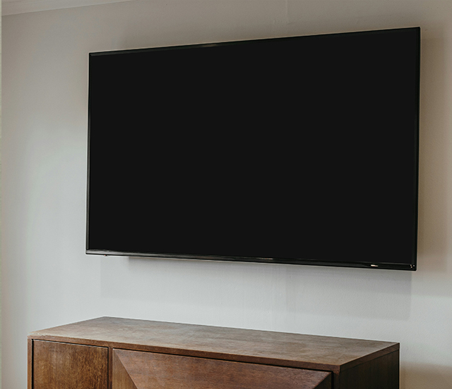 Image of TV mounted on wall